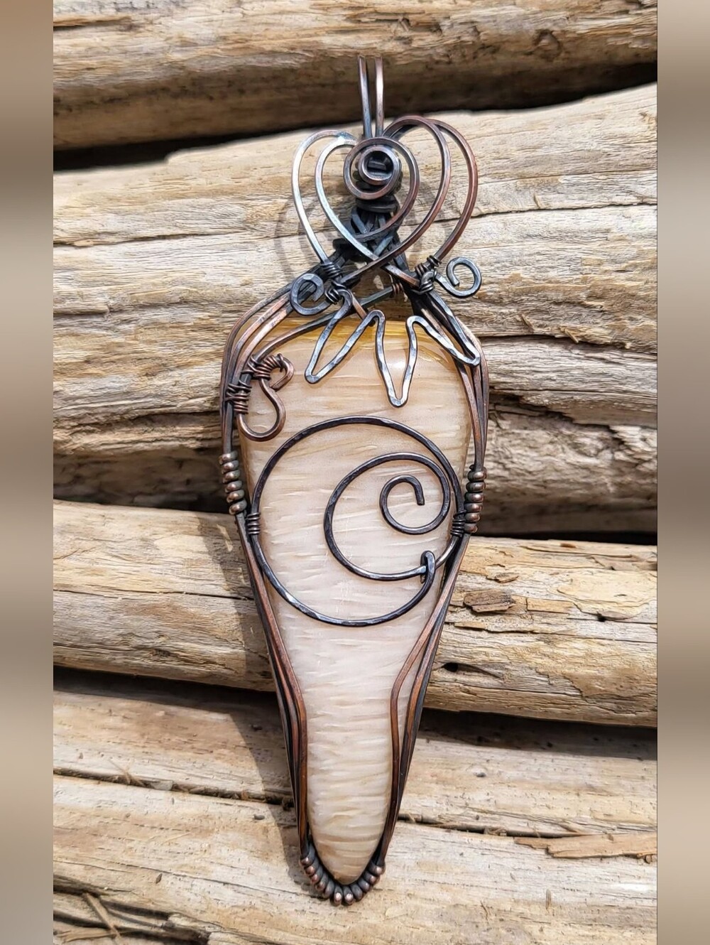 Handcrafted Copper Wire Wrapped Petrified Palm Wood Pendant